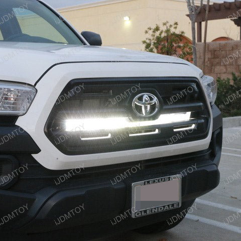 LED Light Bar Sits Subtly Behind a Toyota Tacoma Grille