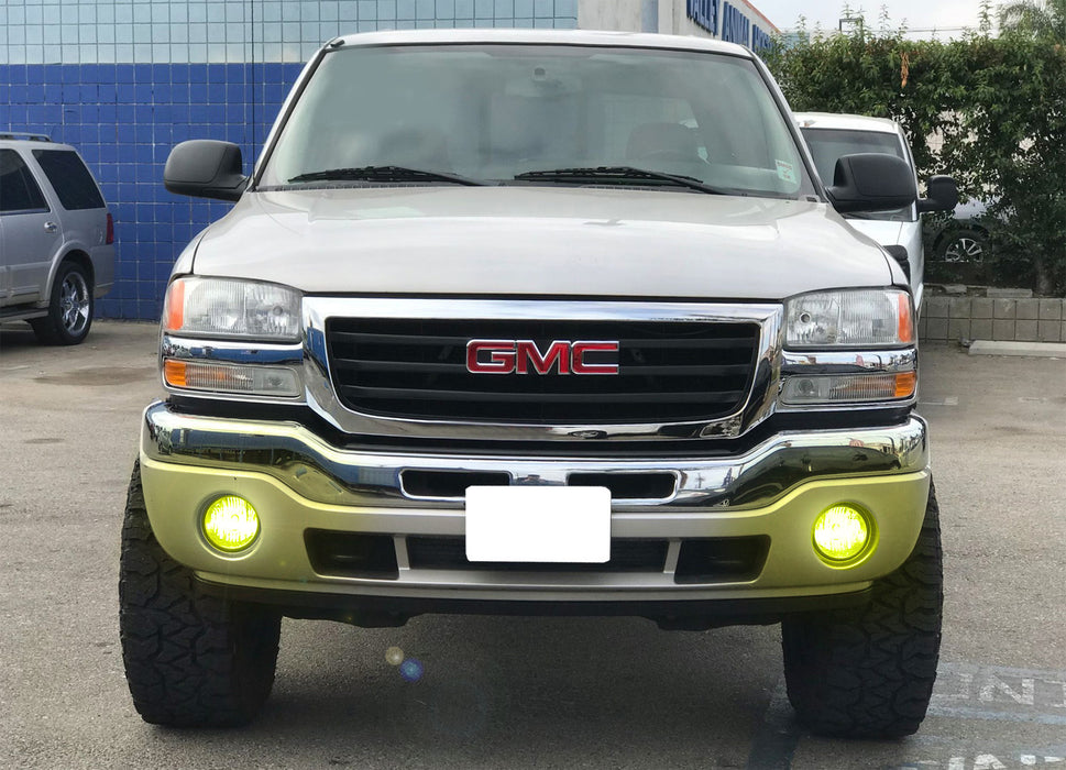 Clear Lens Fog Lamps w/ 2500K Selective Yellow LED Bulbs For 2003-06 GMC Sierra