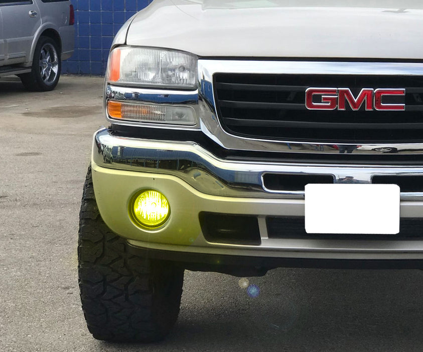 Clear Lens Fog Lamps w/ 2500K Selective Yellow LED Bulbs For 2003-06 GMC Sierra